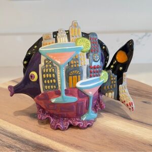 Vibrant Cityscape Fish Figurine with Cocktails